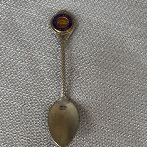 Silver Souvenir Spoon with Blue and Gold Emblem